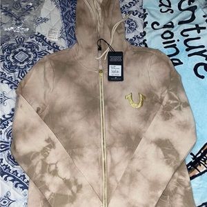 I am selling True religion the sweater is brand new and it a size small